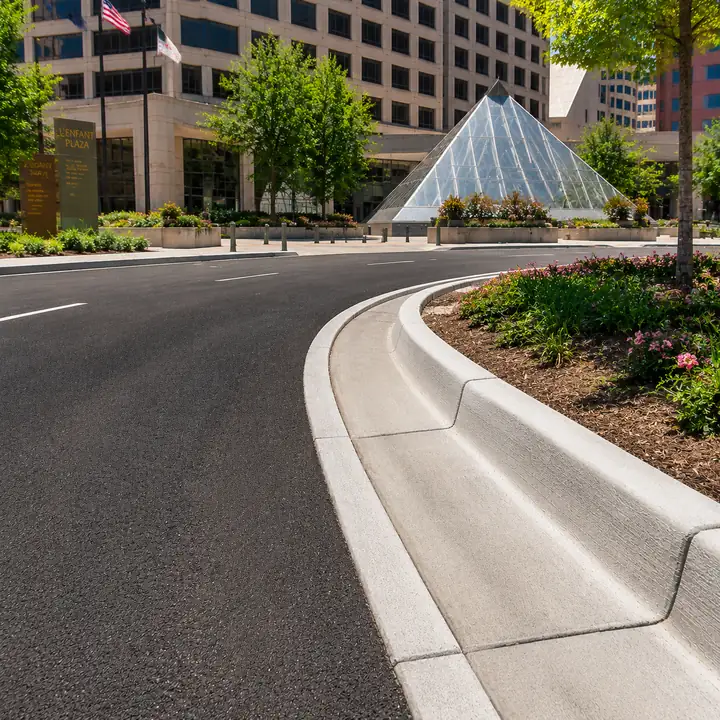AM Developers LLC installed concrete curbs with integrated gutters, roadway drainage systems, and commercial perimeter edges in Washington DC