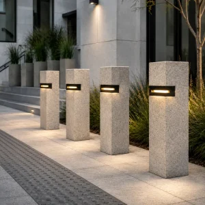 Illuminated luxury concrete safety bollards installed along a public pedestrian walkway by AM Developers LLC near Georgetown Waterfront Park in Washington DC.